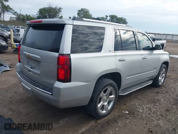 2015 Chevrolet Tahoe LTZ with VIN 1GNSKCKC8FR564678, listed as a IAAI auction lot 43238626 with 161,656 mi miles and . Bid and sale history available at DreamBid. Image 4.