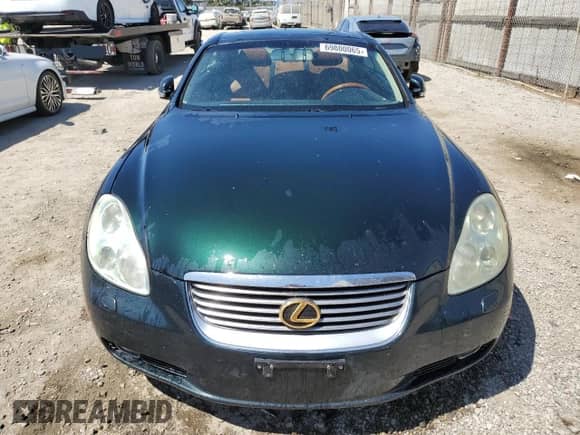 2004 Lexus SC 430 z VIN JTHFN48Y940052356, wystawiony jako Copart lot #69800065 z przebiegiem 176 137 mil mil oraz Czysty tytuł • Clean title. Historia ofert i sprzedaży dostępna na DreamBid. Obrazek 5.