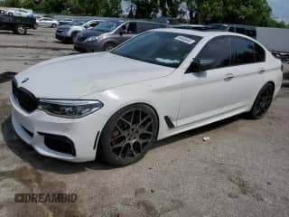 2018 BMW 5 Series M550i xDrive with VIN WBAJB9C5XJB049431, listed as a Copart auction lot 64658445 with Not provided miles and Salvage title. Bid and sale history available at DreamBid. Image 1.