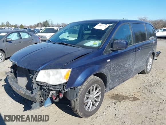 2014 Dodge Grand Caravan American Value with VIN 2C4RDGBG4ER193779, listed as a IAAI auction lot 41447552 with 89,498 mi miles and . Bid and sale history available at DreamBid. Image 18.