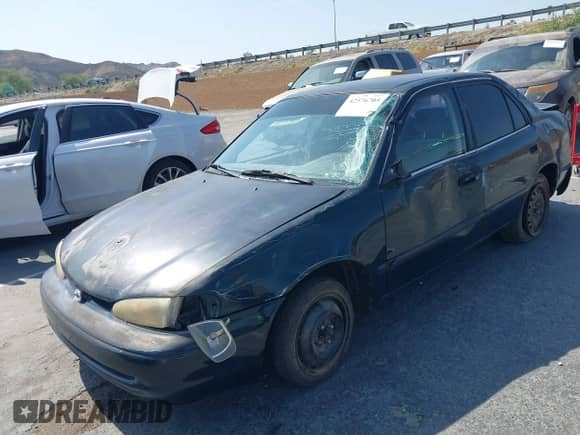 1998 Chevrolet Prizm z VIN 1Y1SK5482WZ433982, wystawiony jako IAAI lot #42576704 z przebiegiem 300 441 mil mil oraz . Historia ofert i sprzedaży dostępna na DreamBid. Obrazek 2.