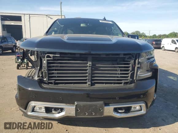 2020 Chevrolet Silverado 1500 High Country с VIN 1GCUYHEL9LZ299838, выставлен на аукционе Copart как лот 57292365 с пробегом 28 560 миль миль и Списание • Salvage title. История ставок и продаж доступна на DreamBid. Изображение 5.