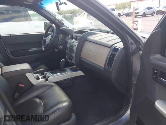 2008 Mercury Mariner Premier with VIN 4M2CU97118KJ53310, listed as a IAAI auction lot 43251176 with 22,170 mi miles and . Bid and sale history available at DreamBid. Image 5.