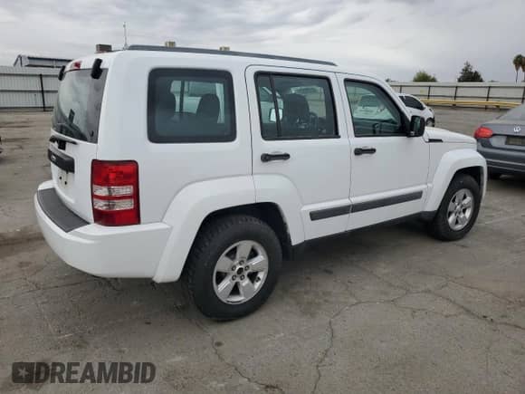 2011 Jeep Liberty Sport with VIN 1J4PN2GK5BW588295, listed as a Copart auction lot 82292585 with 212,541 mi miles and Clean title. Bid and sale history available at DreamBid. Image 3.