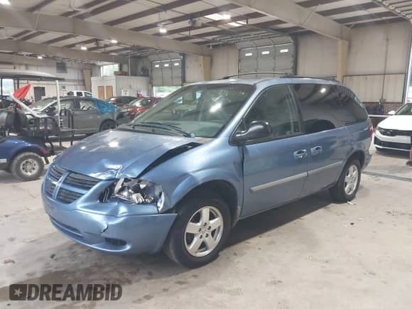 2007 Dodge Caravan SXT with VIN 1D4GP45R87B129081, listed as a IAAI auction lot 42798178 with 209,067 mi miles and . Bid and sale history available at DreamBid. Image 17.