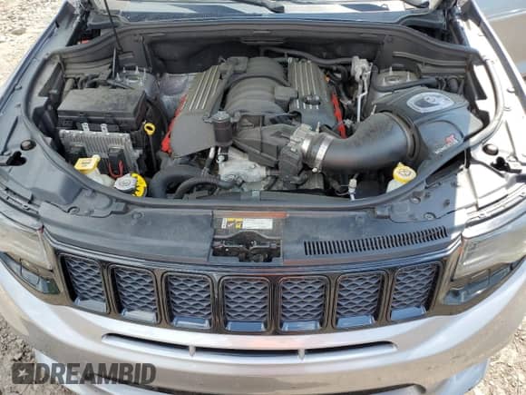 2018 Jeep Grand Cherokee SRT z VIN 1C4RJFDJ2JC508237, wystawiony jako Copart lot #61404555 z przebiegiem 76 990 mil mil oraz Szkoda całkowita • Salvage title. Historia ofert i sprzedaży dostępna na DreamBid. Obrazek 12.