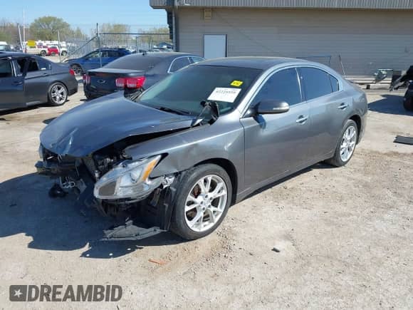 2014 Nissan Maxima SV z VIN 1N4AA5AP6EC448359, wystawiony jako IAAI lot #42225559 z przebiegiem Nie podano mil oraz . Historia ofert i sprzedaży dostępna na DreamBid. Obrazek 16.