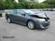 2013 Toyota Camry LE z VIN 4T1BD1FK0DU080437, wystawiony jako Copart lot #71326805 z przebiegiem 214 631 mil mil oraz Szkoda całkowita • Salvage title. Historia ofert i sprzedaży dostępna na DreamBid. Obrazek 13.