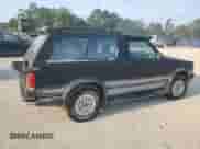 1993 Chevrolet Blazer LS с VIN 1GNCT18W9P0129018, выставлен на аукционе Copart как лот 69456244 с пробегом 93 296 миль миль и Чистый • Clean title. История ставок и продаж доступна на DreamBid. Изображение 3.