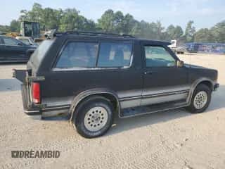 1993 Chevrolet Blazer LS с VIN 1GNCT18W9P0129018, выставлен на аукционе Copart как лот 69456244 с пробегом 93 296 миль миль и Чистый • Clean title. История ставок и продаж доступна на DreamBid. Изображение 3.