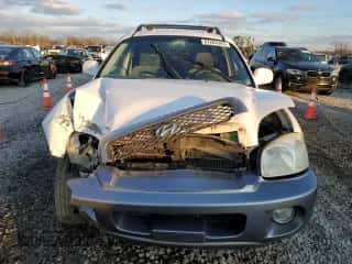 2004 Hyundai Santa Fe GLS с VIN KM8SC13DX4U664028, выставлен на аукционе Copart как лот 87284344 с пробегом Не указан миль и Списание • Salvage title. История ставок и продаж доступна на DreamBid. Изображение 5.