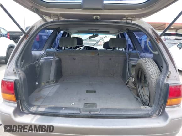 1992 Toyota Camry with VIN 4T1VK12W6NU047357, listed as a IAAI auction lot 42593322 with 325,406 mi miles and . Bid and sale history available at DreamBid. Image 19.