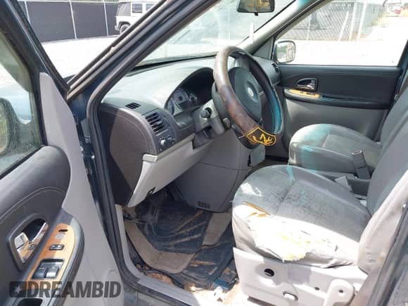 2005 Saturn Relay 2 with VIN 5GZDV03L35D188729, listed as a IAAI auction lot 43097382 with Not provided miles and . Bid and sale history available at DreamBid. Image 5.