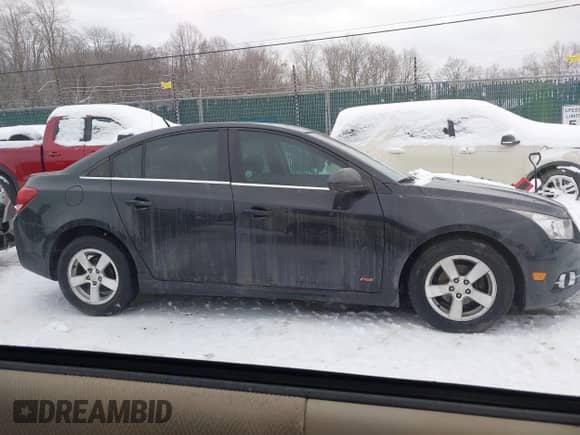 2014 Chevrolet Cruze 1LT with VIN 1G1PD5SB0E7217960, listed as a IAAI auction lot 41251114 with 90,293 mi miles and . Bid and sale history available at DreamBid. Image 13.