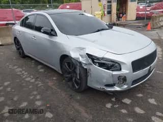 2014 Nissan Maxima S with VIN 1N4AA5AP3EC495087, listed as a IAAI auction lot 43122516 with 122,886 mi miles and . Bid and sale history available at DreamBid. Image 1.