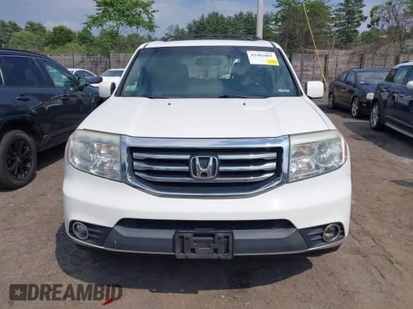 2013 Honda Pilot EX-L with VIN 5FNYF4H63DB077552, listed as a IAAI auction lot 42483801 with 218,823 mi miles and . Bid and sale history available at DreamBid. Image 12.