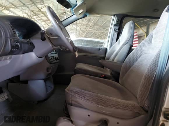 2000 Dodge Caravan with VIN 2B4GP25GXYR896821, listed as a Copart auction lot 58079985 with 217,327 mi miles and Salvage title. Bid and sale history available at DreamBid. Image 7.