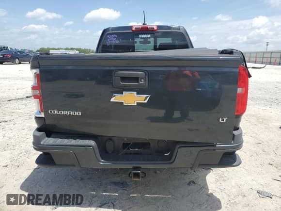 2018 Chevrolet Colorado 2WD LT с VIN 1GCHSCEA0J1167163, выставлен на аукционе Copart как лот 60239725 с пробегом 151 891 миль миль и Списание • Salvage title. История ставок и продаж доступна на DreamBid. Изображение 6.