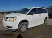 2010 Dodge Grand Caravan SE with VIN 2D4RN4DE8AR239439, listed as a Copart auction lot 86256015 with 206,971 mi miles and Salvage title. Bid and sale history available at DreamBid. Image 1.