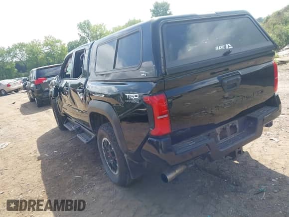 2024 Toyota Tacoma SR5 with VIN 3TMLB5JN4RM054958, listed as a IAAI auction lot 43047601 with 15,429 mi miles and . Bid and sale history available at DreamBid. Image 3.
