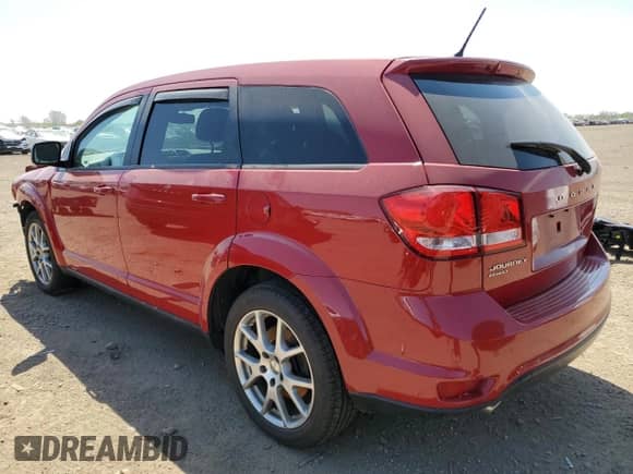 2012 Dodge Journey R/T with VIN 3C4PDDEG1CT285783, listed as a Copart auction lot 55577395 with 75,910 mi miles and Salvage title. Bid and sale history available at DreamBid. Image 2.