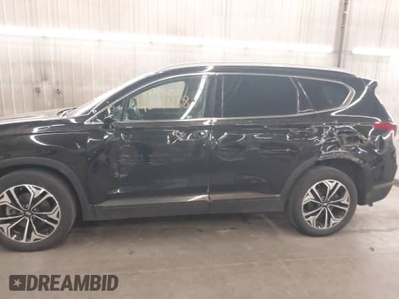 2019 Hyundai Santa Fe Ultimate z VIN 5NMS5CAA3KH067925, wystawiony jako IAAI lot #42016668 z przebiegiem 42 474 mil mil oraz . Historia ofert i sprzedaży dostępna na DreamBid. Obrazek 6.