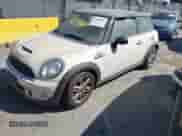 2013 MINI Hardtop S with VIN WMWSV3C50DT389890, listed as a IAAI auction lot 43153997 with 132,527 mi miles and . Bid and sale history available at DreamBid. Image 2.