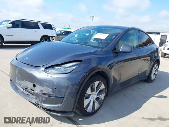 2022 Tesla Model Y Long Range z VIN 7SAYGAEE7NF389319, wystawiony jako IAAI lot #42492523 z przebiegiem Nie podano mil oraz . Historia ofert i sprzedaży dostępna na DreamBid. Obrazek 2.