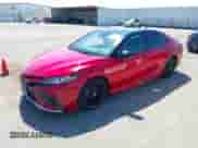 2023 Toyota Camry TRD with VIN 4T1KZ1AK5PU075750, listed as a IAAI auction lot 43285014 with 38,584 mi miles and . Bid and sale history available at DreamBid. Image 2.