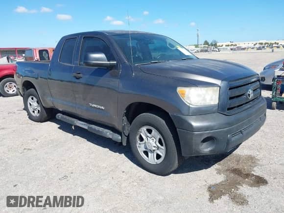 2012 Toyota Tundra z VIN 5TFRU5F19CX026861, wystawiony jako IAAI lot #41827542 z przebiegiem 135 428 mil mil oraz . Historia ofert i sprzedaży dostępna na DreamBid. Obrazek 1.