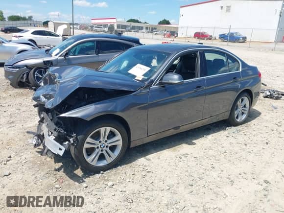 2018 BMW 3 Series 330i with VIN WBA8B9C55JK676715, listed as a IAAI auction lot 42196231 with 107,501 mi miles and . Bid and sale history available at DreamBid. Image 2.