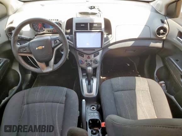 2014 Chevrolet Sonic LT с VIN 1G1JC5SHXE4243836, выставлен на аукционе Copart как лот 70467955 с пробегом 107 855 миль миль и Списание • Salvage title. История ставок и продаж доступна на DreamBid. Изображение 8.