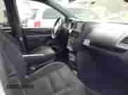 2020 Dodge Grand Caravan SE with VIN 2C4RDGBG1LR227593, listed as a IAAI auction lot 43546924 with 149,014 mi miles and . Bid and sale history available at DreamBid. Image 5.