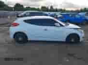 2014 Hyundai Veloster z VIN KMHTC6AD0EU204382, wystawiony jako IAAI lot #40287015 z przebiegiem 110 460 mil mil oraz . Historia ofert i sprzedaży dostępna na DreamBid. Obrazek 14.