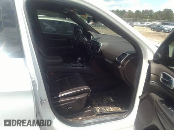 2018 Jeep Grand Cherokee Overland with VIN 1C4RJFCG0JC326025, listed as a IAAI auction lot 42387079 with 182,046 mi miles and . Bid and sale history available at DreamBid. Image 5.