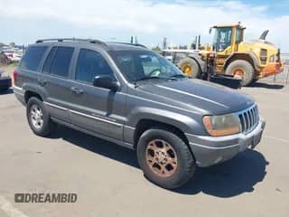 2002 Jeep Grand Cherokee with VIN 1J4GX38S82C170992, listed as a IAAI auction lot 42935032 with 155,869 mi miles and . Bid and sale history available at DreamBid. Image 1.