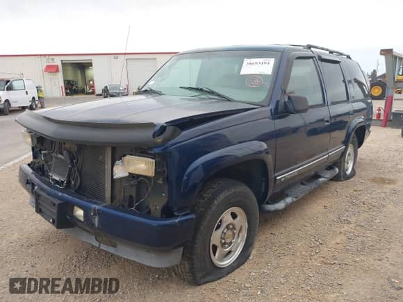 2000 Chevrolet Tahoe Z71 with VIN 1GNEK13R3YR105727, listed as a IAAI auction lot 38693494 with 106,637 mi miles and . Bid and sale history available at DreamBid. Image 2.