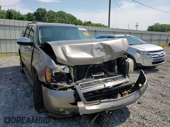 2011 Chevrolet Tahoe LT с VIN 1GNSCBE09BR354478, выставлен на аукционе Copart как лот 66722225 с пробегом 200 582 миль миль и Списание • Salvage title. История ставок и продаж доступна на DreamBid. Изображение 14.