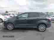 2017 Ford Escape Titanium with VIN 1FMCU0J97HUB04015, listed as a IAAI auction lot 43211466 with 200,577 mi miles and . Bid and sale history available at DreamBid. Image 13.