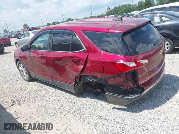 2021 Chevrolet Equinox LT z VIN 2GNAXUEV0M6154000, wystawiony jako IAAI lot #42657911 z przebiegiem 64 765 mil mil oraz . Historia ofert i sprzedaży dostępna na DreamBid. Obrazek 3.