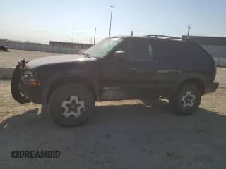 2000 Chevrolet Blazer LS с VIN 1GNCT18WXYK265146, выставлен на аукционе Copart как лот 81251435 с пробегом 353 245 миль миль и Чистый • Clean title. История ставок и продаж доступна на DreamBid. Изображение 1.