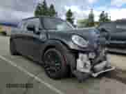 2019 MINI Hardtop Cooper with VIN WMWXP5C56K2H31697, listed as a Copart auction lot 48826655 with 60,190 mi miles and Salvage title. Bid and sale history available at DreamBid. Image 4.