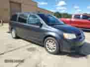 2014 Dodge Grand Caravan SXT 30th Anniversary with VIN 2C4RDGCG6ER214484, listed as a Copart auction lot 86530365 with 220,842 mi miles and Clean title. Bid and sale history available at DreamBid. Image 4.