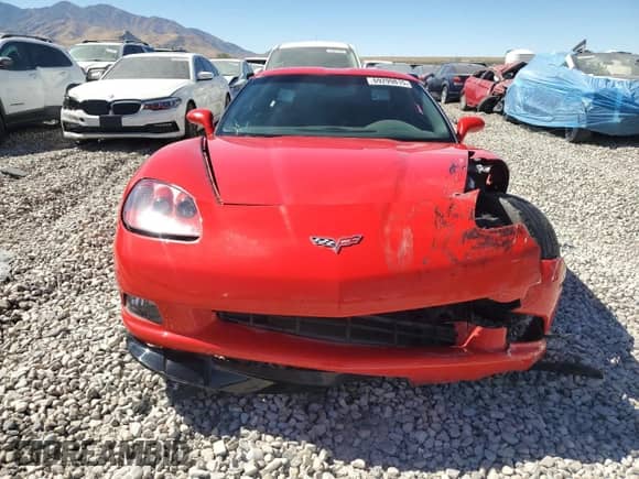 2013 Chevrolet Corvette 1LT z VIN 1G1YE2DWXD5103782, wystawiony jako Copart lot #69299815 z przebiegiem 29 149 mil mil oraz Szkoda całkowita • Salvage title. Historia ofert i sprzedaży dostępna na DreamBid. Obrazek 5.