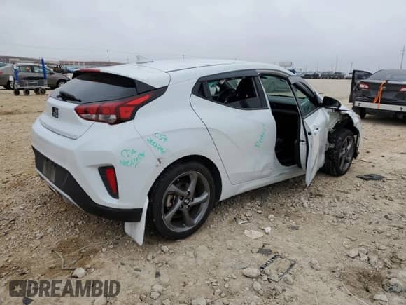 2019 Hyundai Veloster 2.0 z VIN KMHTG6AF5KU018693, wystawiony jako Copart lot #76660363 z przebiegiem 74 498 mil mil oraz . Historia ofert i sprzedaży dostępna na DreamBid. Obrazek 3.