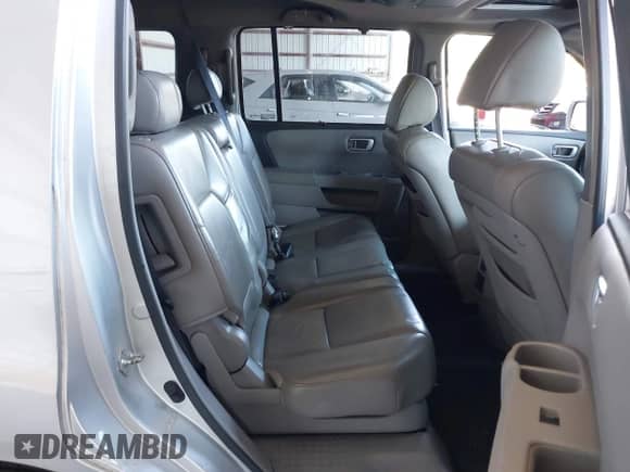2009 Honda Pilot Touring with VIN 5FNYF48929B004092, listed as a IAAI auction lot 43116551 with 232,447 mi miles and . Bid and sale history available at DreamBid. Image 8.