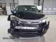 2019 Honda Pilot EX z VIN 5FNYF6H3XKB048032, wystawiony jako Copart lot #69950785 z przebiegiem 99 926 mil mil oraz Szkoda całkowita • Salvage title. Historia ofert i sprzedaży dostępna na DreamBid. Obrazek 5.