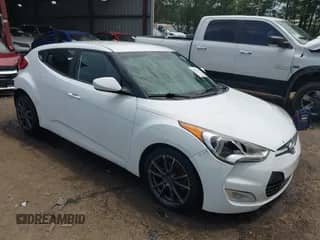 2017 Hyundai Veloster z VIN KMHTC6AD2HU306769, wystawiony jako IAAI lot #42457478 z przebiegiem 128 155 mil mil oraz . Historia ofert i sprzedaży dostępna na DreamBid. Obrazek 1.