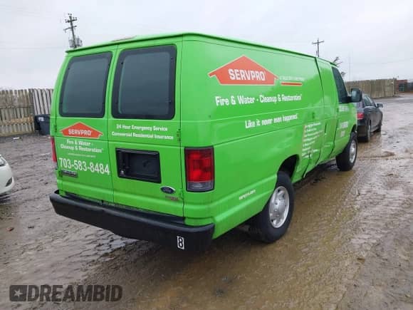 2012 Ford Econoline Cargo Commercial with VIN 1FTNS2EWXCDA43833, listed as a IAAI auction lot 41335268 with 181,390 mi miles and . Bid and sale history available at DreamBid. Image 4.