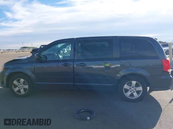 2013 Dodge Grand Caravan SE with VIN 2C4RDGBGXDR791339, listed as a IAAI auction lot 43387058 with 212,746 mi miles and . Bid and sale history available at DreamBid. Image 14.